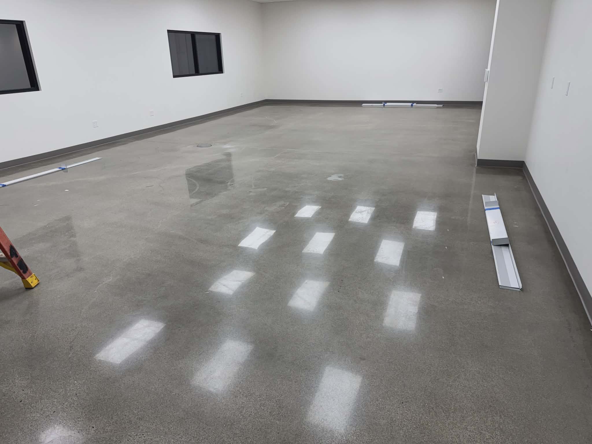Commercial office epoxy flooring with polished concrete appearance